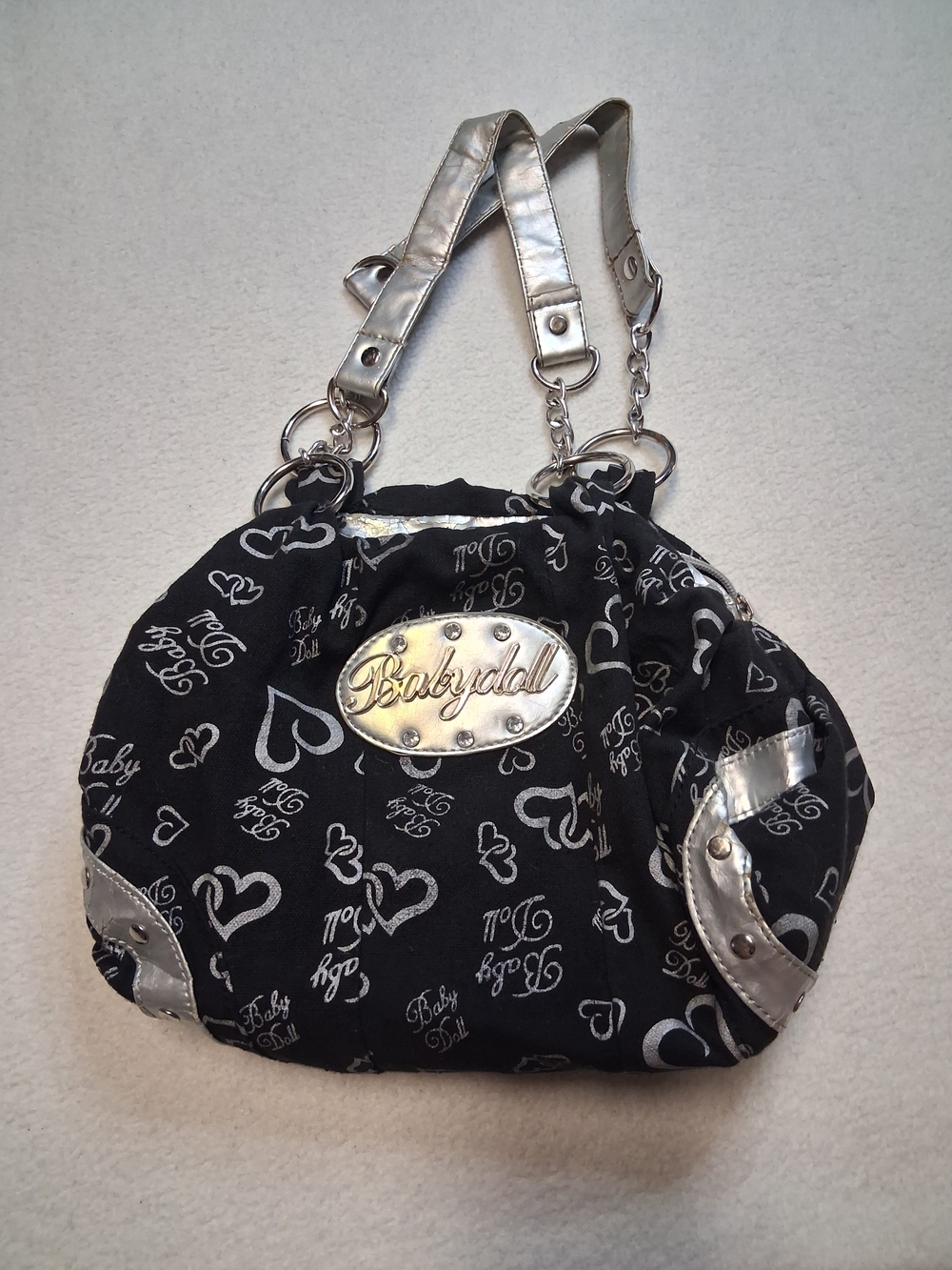 Miss Babydoll Black Shoulder Bag with Silver Accents
